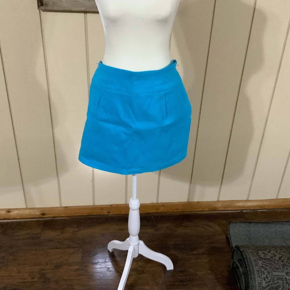 Turquoise skort.  Size 8.